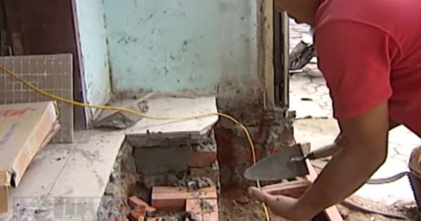 Người Hà Nội bỏ tiền triệu xây bậc tam cấp thụt vào nhà