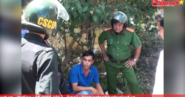 Cảnh sát vây bắt kẻ bắn chết vợ, ôm súng cố thủ