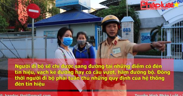 TP HCM: Hàng loạt người đi bộ bị CSGT nhắc nhở vì vi phạm luật giao thông