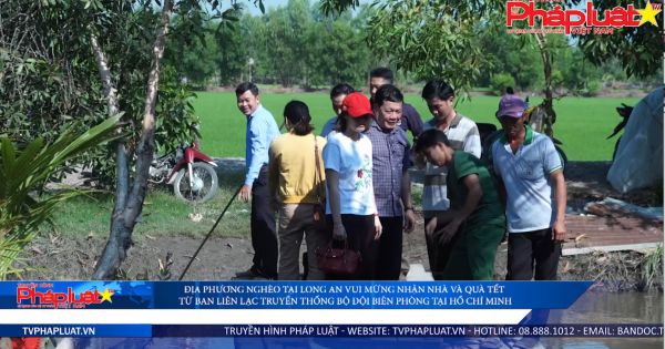 Ban liên lạc Truyền thống Bộ đội Biên phòng tại TP.HCM trao nhà và quà cho bà con nghèo tại Long An