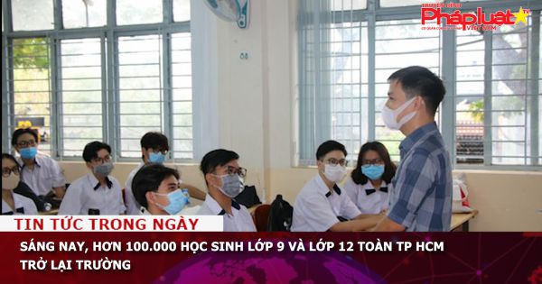 Sáng nay, hơn 100.000 học sinh lớp 9 và lớp 12 toàn TP HCM trở lại trường