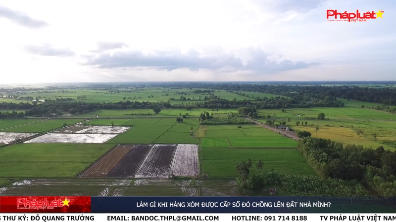Làm gì khi hàng xóm được cấp sổ đỏ chồng lên đất nhà mình?